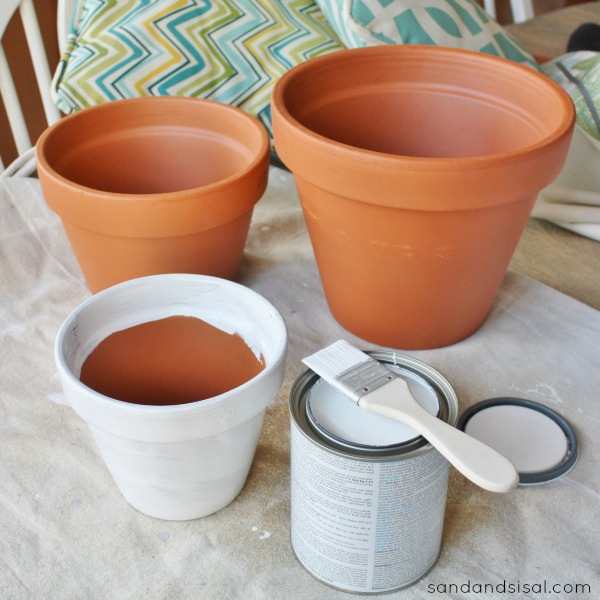 What are some ways of painting clay pots?