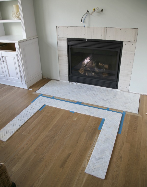 Laying out a herringbone tile surround