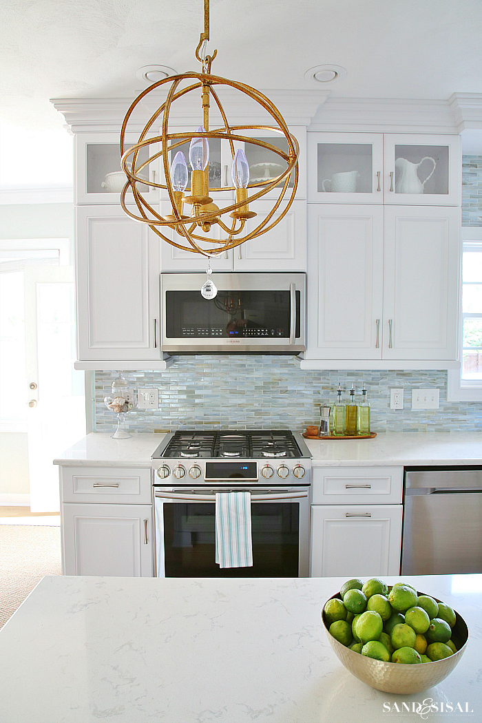 Kitchen Cabinet Organization {Taming the Tupperware} - Sand and Sisal