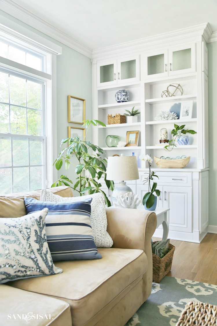 Escape to the sea with this summer blues coastal family room tour! Get easy coastal decorating ideas to transform your home into a chic coastal retreat. Complete with product source links! 