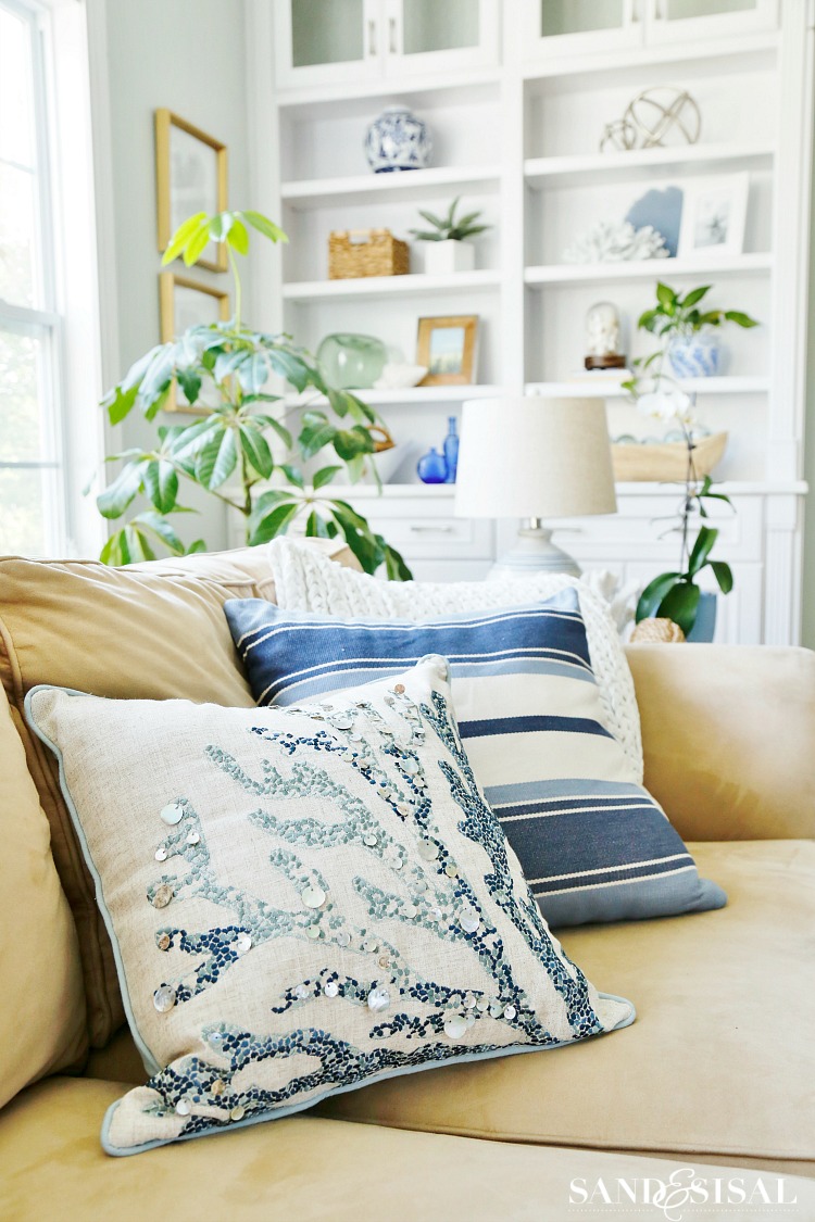 Escape to the sea with this summer blues coastal family room tour! Get easy coastal decorating ideas to transform your home into a chic coastal retreat. Complete with product source links! 