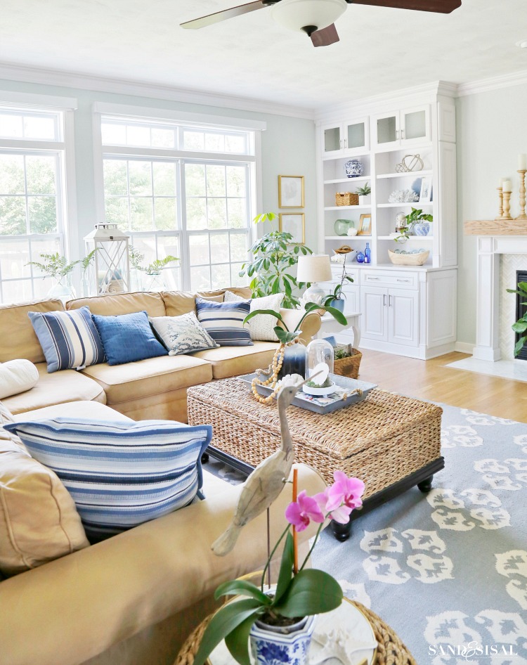 Escape to the sea with this summer blues coastal family room tour! Get easy coastal decorating ideas to transform your home into a chic coastal retreat. Complete with product source links! 