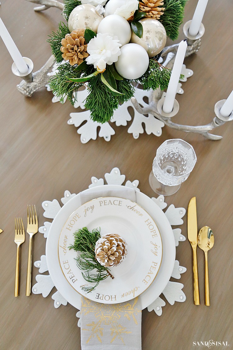 White Christmas Table Setting - Neutral Rustic Glam Christmas Dining Room. #rusticglam #rusticdecor #christmastable #neutralchristmas #rusticchic #coastalliving #diningroom